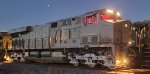 The Red Light District of BNSF 3283 As Night Has Fallen at Wabtec.